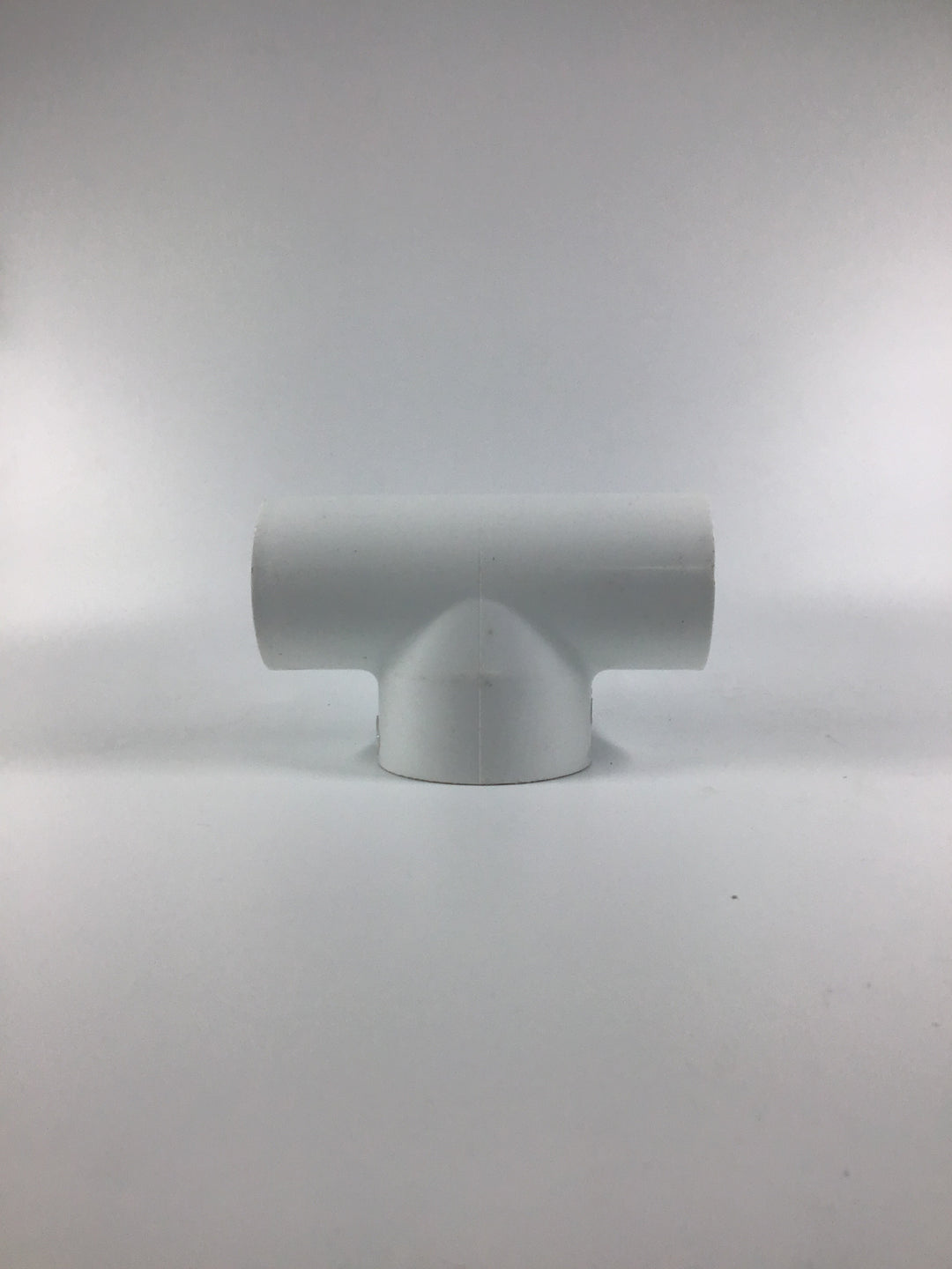401-213 1 1/2" x 2" SCH 40 PVC Tee Socket - Durable & Versatile Plumbing Fitting