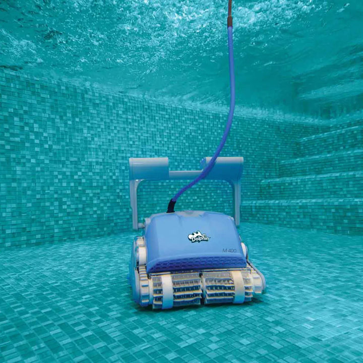 Dolphin M400 Deluxe robotic pool cleaner cleaning a tiled pool floor